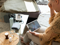 Source: Freepik; Copyright: freepik; URL: https://www.freepik.com/free-photo/close-up-woman-holding-tablet_15186600.htm; License: Licensed by JMIR.