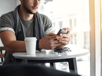 Source: Freepik; Copyright: cookie_studio; URL: https://www.freepik.com/free-photo/cropped-image-man-texting-message-phone-cafe_8754009.htm; License: Licensed by JMIR.