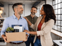 AI prompt "A man returning to work after absence, being welcomed by a female manager and a male colleague in a modern office environment, with a supportive gesture such as a hand on the shoulder.". Source: AI-generated image DALL-E; Copyright: N/A (AI-generated image); URL: https://cancer.jmir.org/2026/1/e89954; License: Public Domain (CC0).
