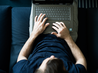 Working from the sofa on a laptop during a period of work from home. Source: Flickr; Copyright: Microbiz Mag; URL: https://www.flickr.com/photos/microbizmag/49854170076/; License: Creative Commons Attribution (CC-BY).