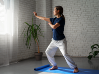 Source: Freepik; Copyright: Freepik; URL: https://www.freepik.com/free-photo/full-shot-woman-practising-tai-chi-indoors_38170972.htm; License: Licensed by JMIR.