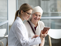 Source: freepik; Copyright: freepik; URL: https://www.freepik.com/free-photo/middle-aged-woman-with-skin-cancer-talking-with-her-doctor_14831357.htm; License: Licensed by JMIR.