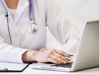 Source: freepik; Copyright: freepik; URL: https://www.freepik.com/free-photo/female-doctor-with-stethoscope-around-her-neck-using-laptop-desk_4435674.htm; License: Licensed by JMIR.
