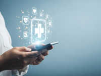The image of a patient searching for information. Source: Adobestock; Copyright: senyumanmu; URL: https://stock.adobe.com/jp/images/a-person-holds-a-smartphone-displaying-glowing-medical-icons-with-a-bright-cross-at-the-center/1618118562?prev_url=detail; License: Licensed by the authors.