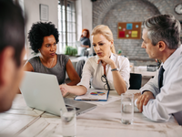 Source: Magnific; Copyright: Drazen Zigic; URL: https://www.magnific.com/free-photo/mid-adult-businesswoman-talking-her-colleagues-while-using-laptop-pointing-screen-office_25485448.htm#fromView=search&page=1&position=1&uuid=7f5bfd84-f6db-4d38-b6f5-d5b7773c8a3e&query=healthcare+provider+discussion; License: Licensed by JMIR.