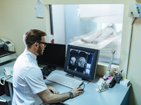 Source: Magnific; Copyright: Drazen Zigic; URL: https://www.magnific.com/free-photo/male-radiologist-analyzing-mri-scan-results-patient-computer-monitor-control-room_26143902.htm; License: Licensed by JMIR.