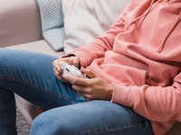 Source: Freepik; Copyright: freepik; URL: https://www.freepik.com/free-photo/close-up-man-with-joystick-couch_6528089.htm; License: Licensed by JMIR.