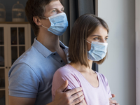 Source: freepik; Copyright: freepik; URL: https://www.freepik.com/free-photo/man-woman-wearing-face-mask-home_10163971.htm; License: Licensed by JMIR.
