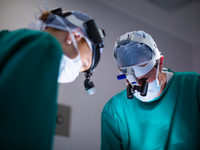 Source: Freepik; Copyright: wavebreakmedia_micro; URL: https://www.freepik.com/free-photo/surgeons-wearing-surgical-loupes-while-performing-operation_8402437.htm; License: Licensed by JMIR.
