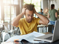 Source: Freepik; Copyright: wayhomestudio; URL: https://www.freepik.com/free-photo/international-afro-american-student-feeling-stressed-keeping-hands-his-head-staring-laptop-screen-frustration-despair_9761576.htm; License: Licensed by JMIR.