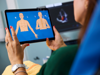 Patient filling out computerized history taking. Source: Fredrik Persson; Copyright: Fredrik Persson; URL: https://www.jmir.org/2026/1/e76087/; License: Creative Commons Attribution (CC-BY).