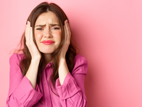 Source: Freepik; Copyright: benzoix; URL: https://www.freepik.com/free-photo/close-up-distressed-bothered-young-woman-covering-her-ears-grimacing-cant-bear-this-anymore-standing-overwhelmed-against-pink-background_273452119.htm; License: Licensed by JMIR.