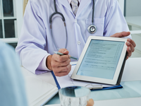 Source: Freepik; Copyright: pressfoto; URL: https://www.freepik.com/free-photo/unrecognizable-doctor-extending-digital-tab-anonymous-patient-fill-questionnaire_5699298.htm; License: Licensed by JMIR.